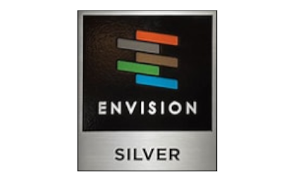 A silver logo with the word evision.