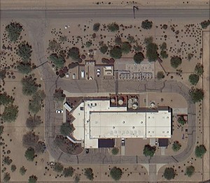An aerial view of a building in the desert by mgc contractors.