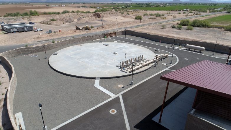 An aerial view of a water treatment plant in the desert.